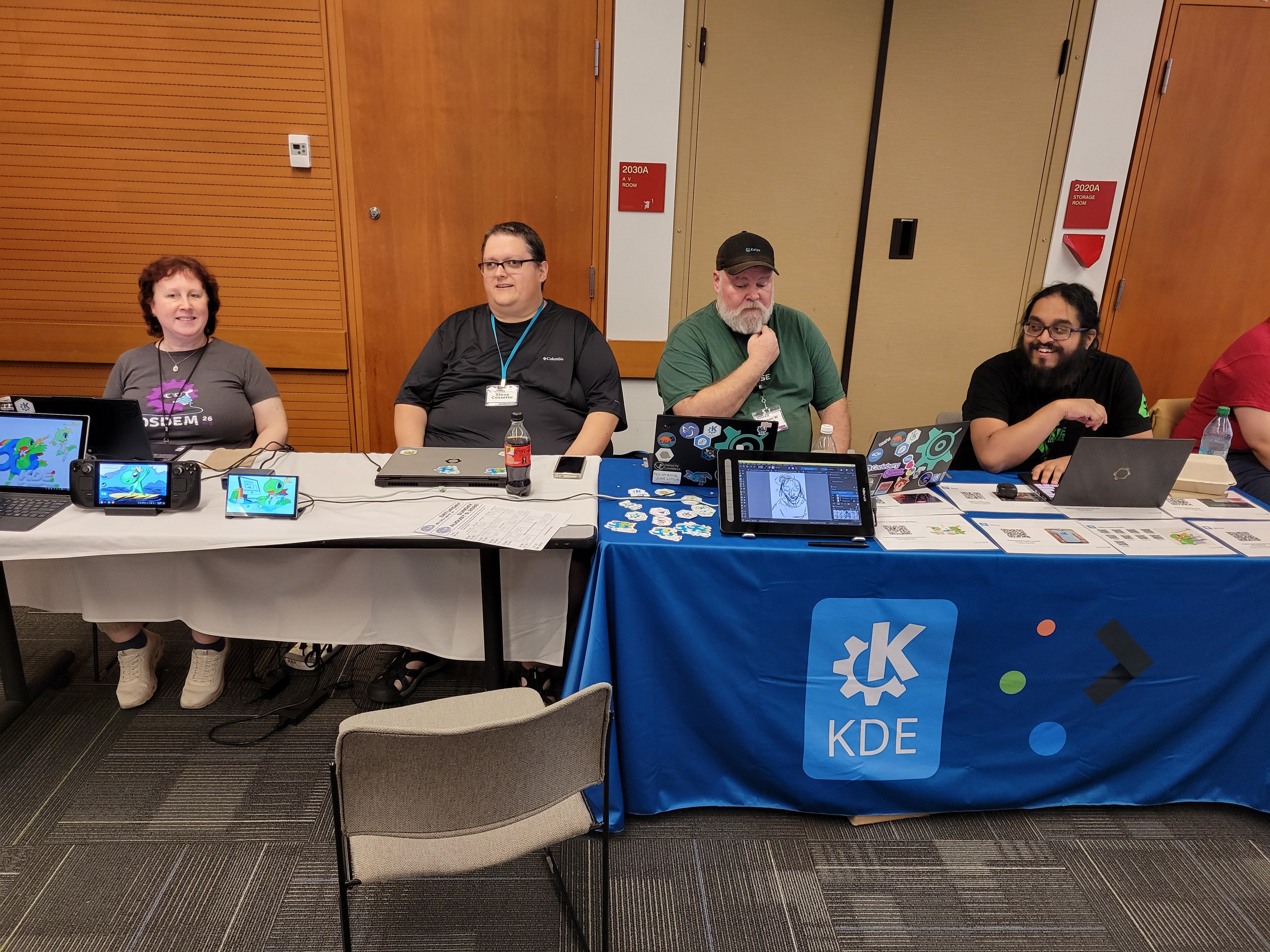The Camp KDE table, stocked with stickers